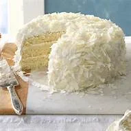 Classic coconut cake with fluffy frosting and layers