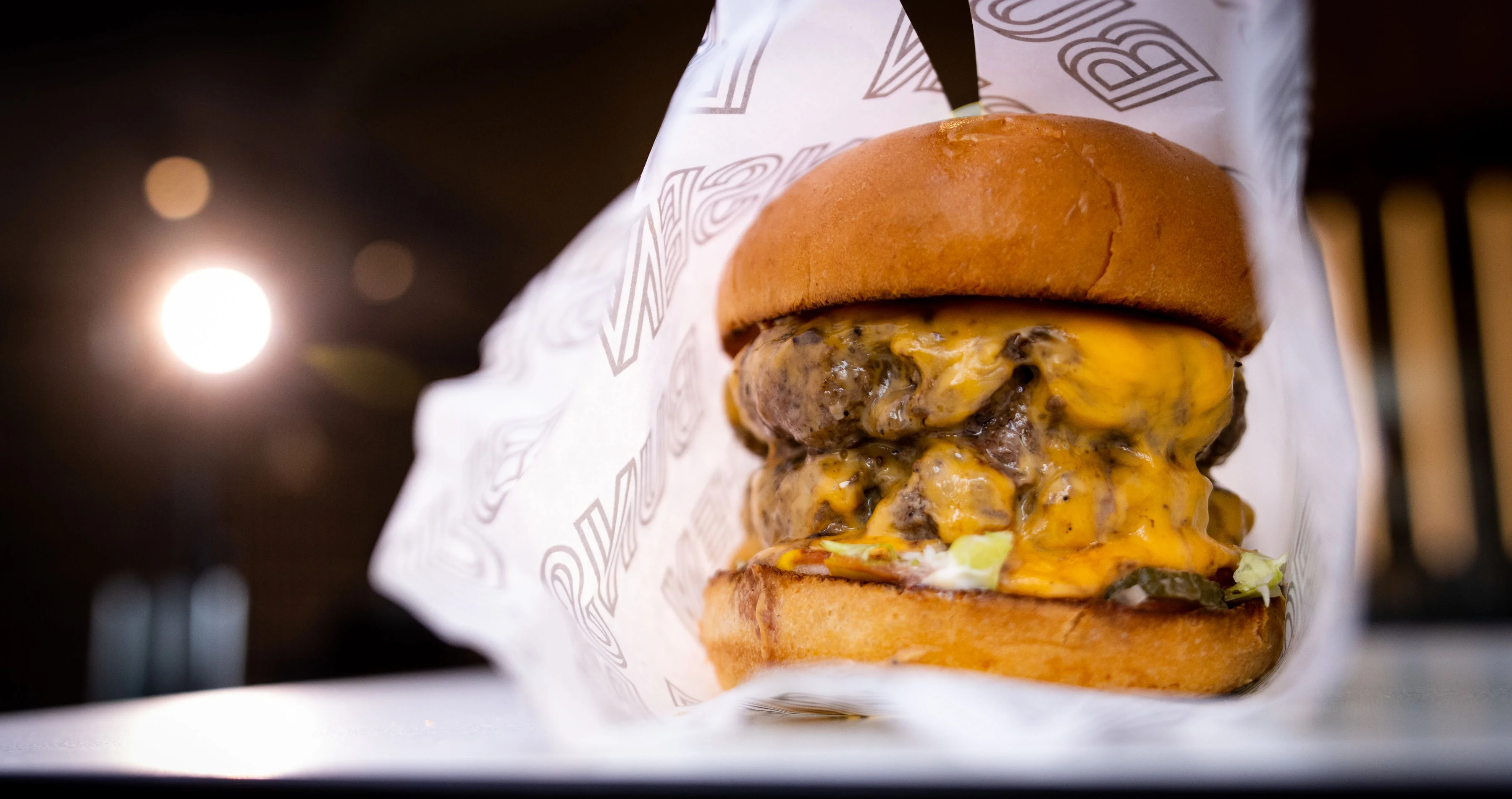 Juicy cheeseburger with melted cheese and fresh toppings