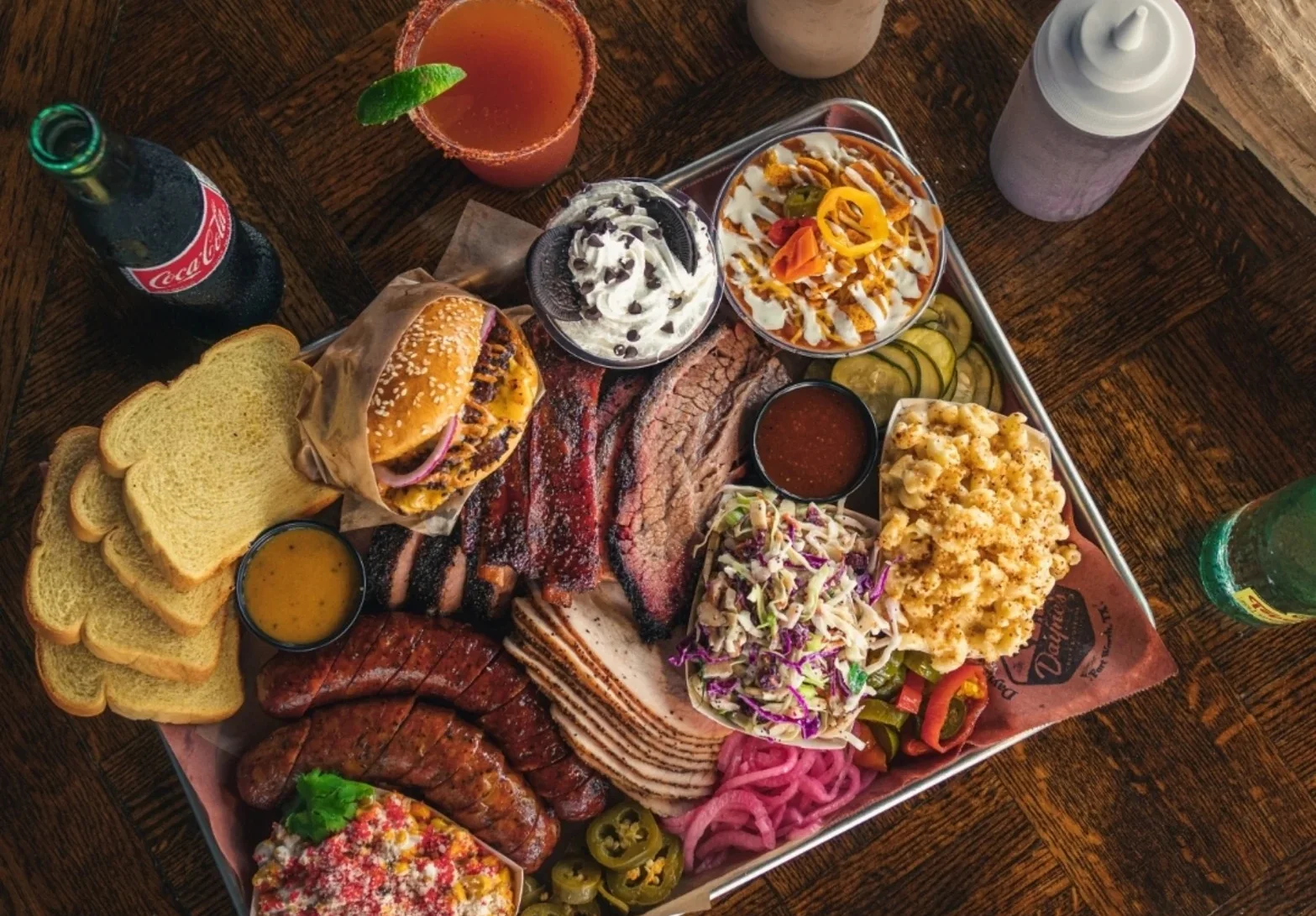 Delicious gourmet burger with fresh toppings on a wooden table