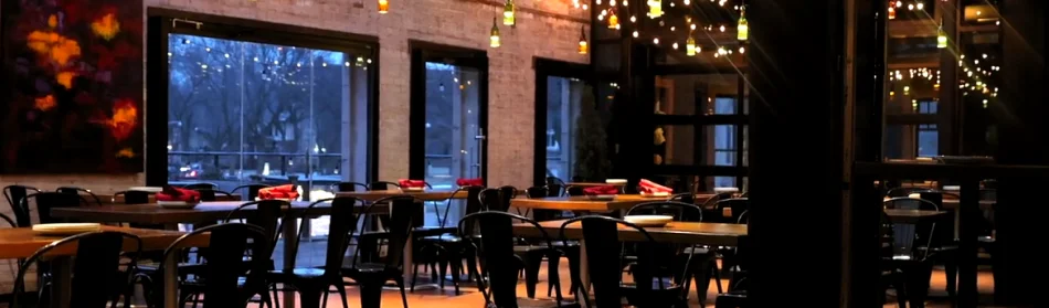 Cozy restaurant interior with warm lighting and rustic decor