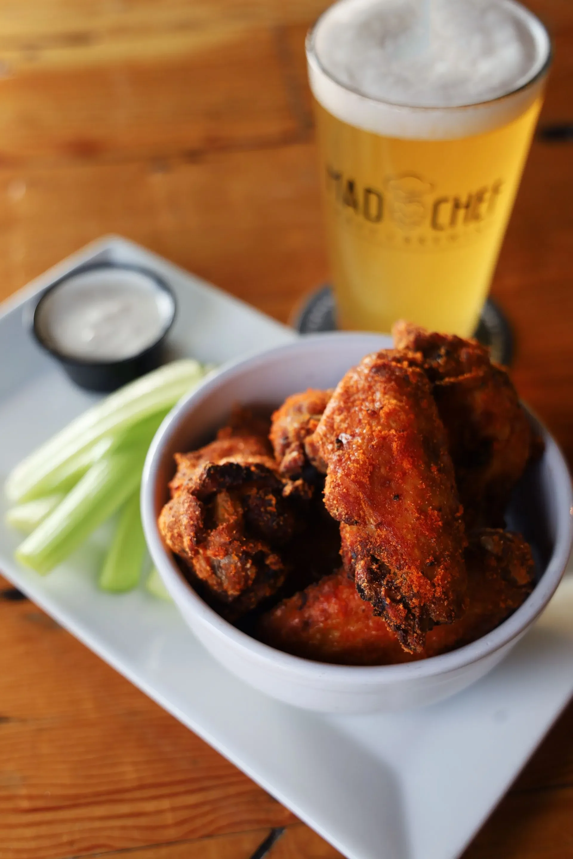 Delicious crispy chicken wings served with dipping sauce