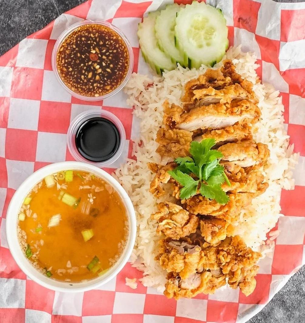 Crispy fried chicken rice bowl with soup and dipping sauces