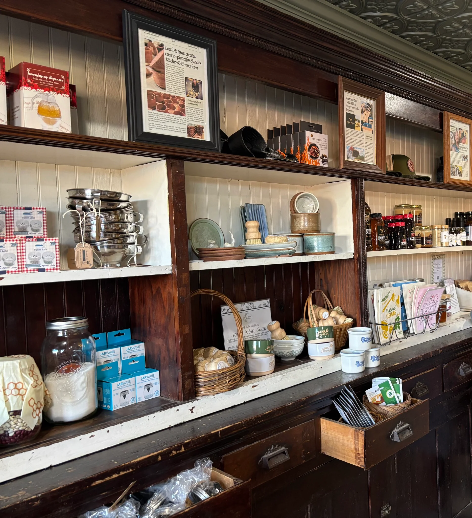 Charming kitchenware display in a rustic shop