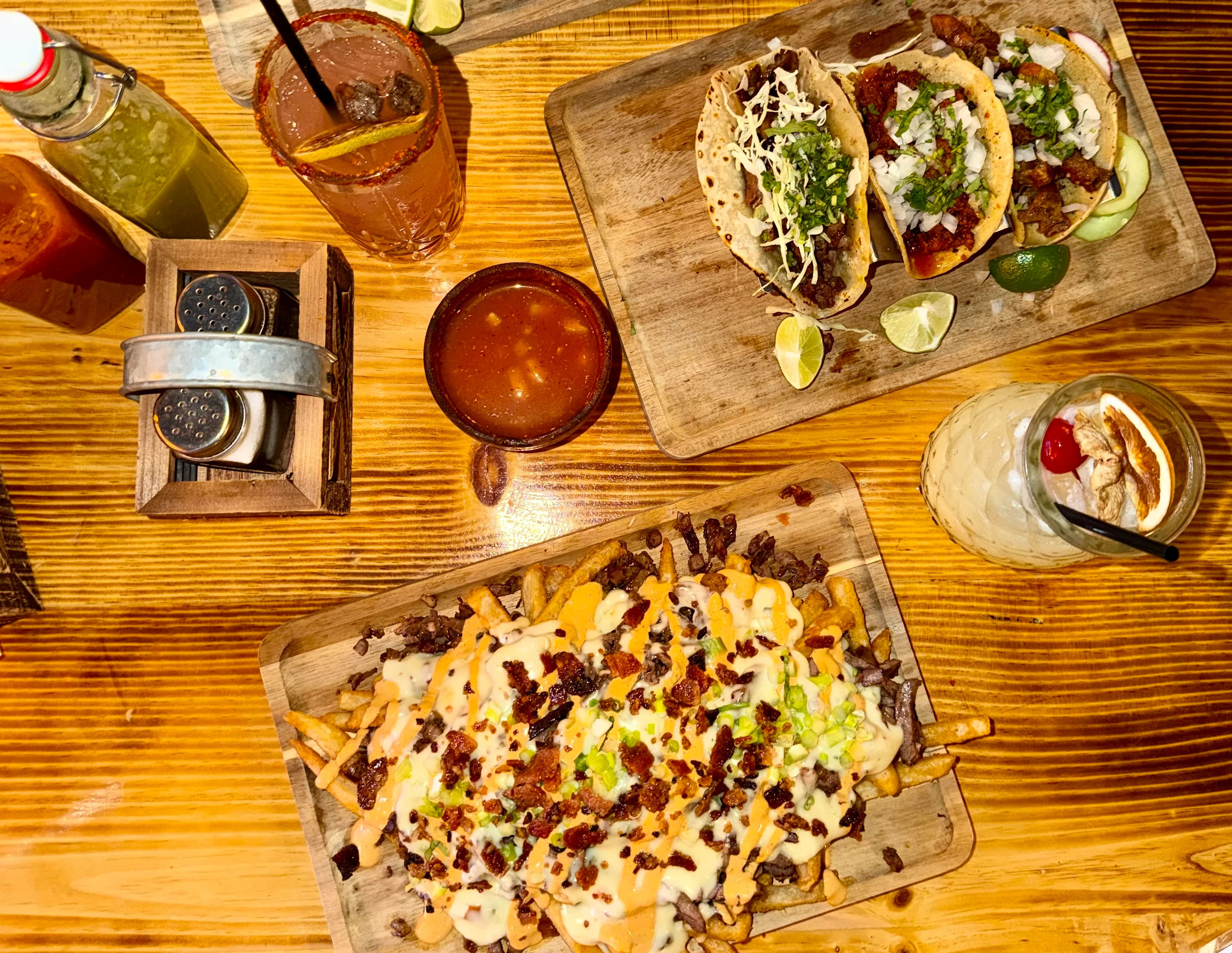 Delicious gourmet burger with fresh toppings on a wooden table