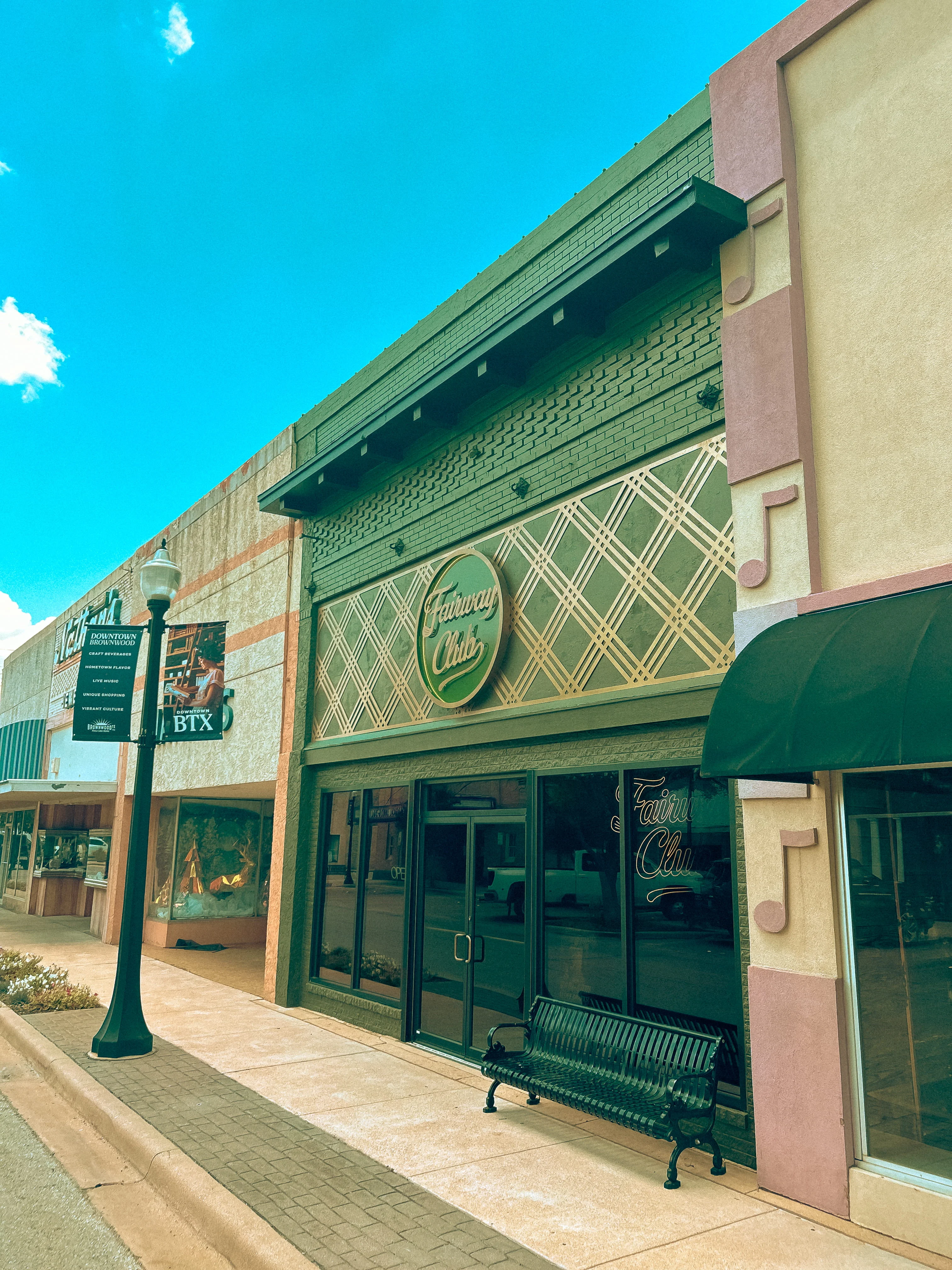 Exterior view of a restaurant with a prominent 'F' logo on the window.