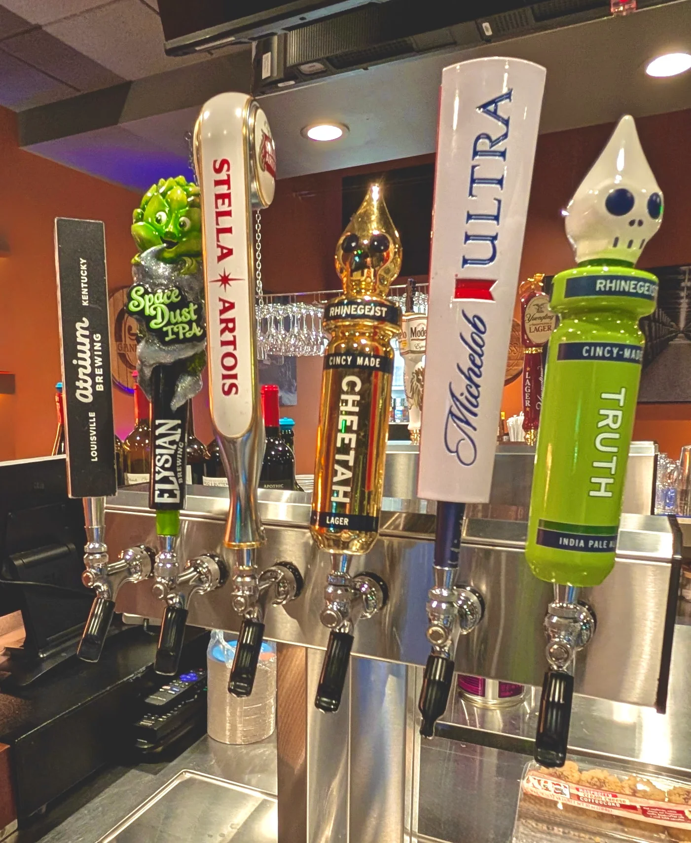 Craft beer taps featuring various local brews