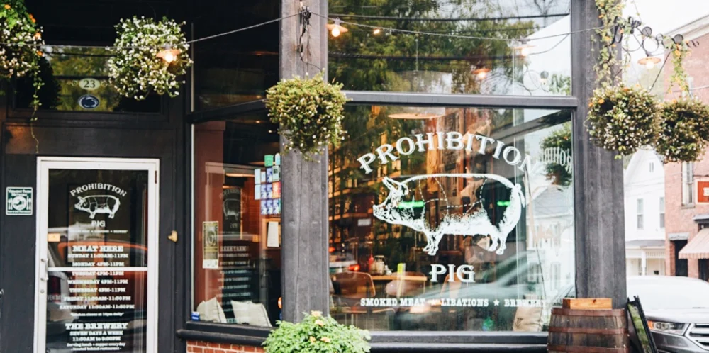 Exterior view of Prohibition Pig restaurant with inviting decor
