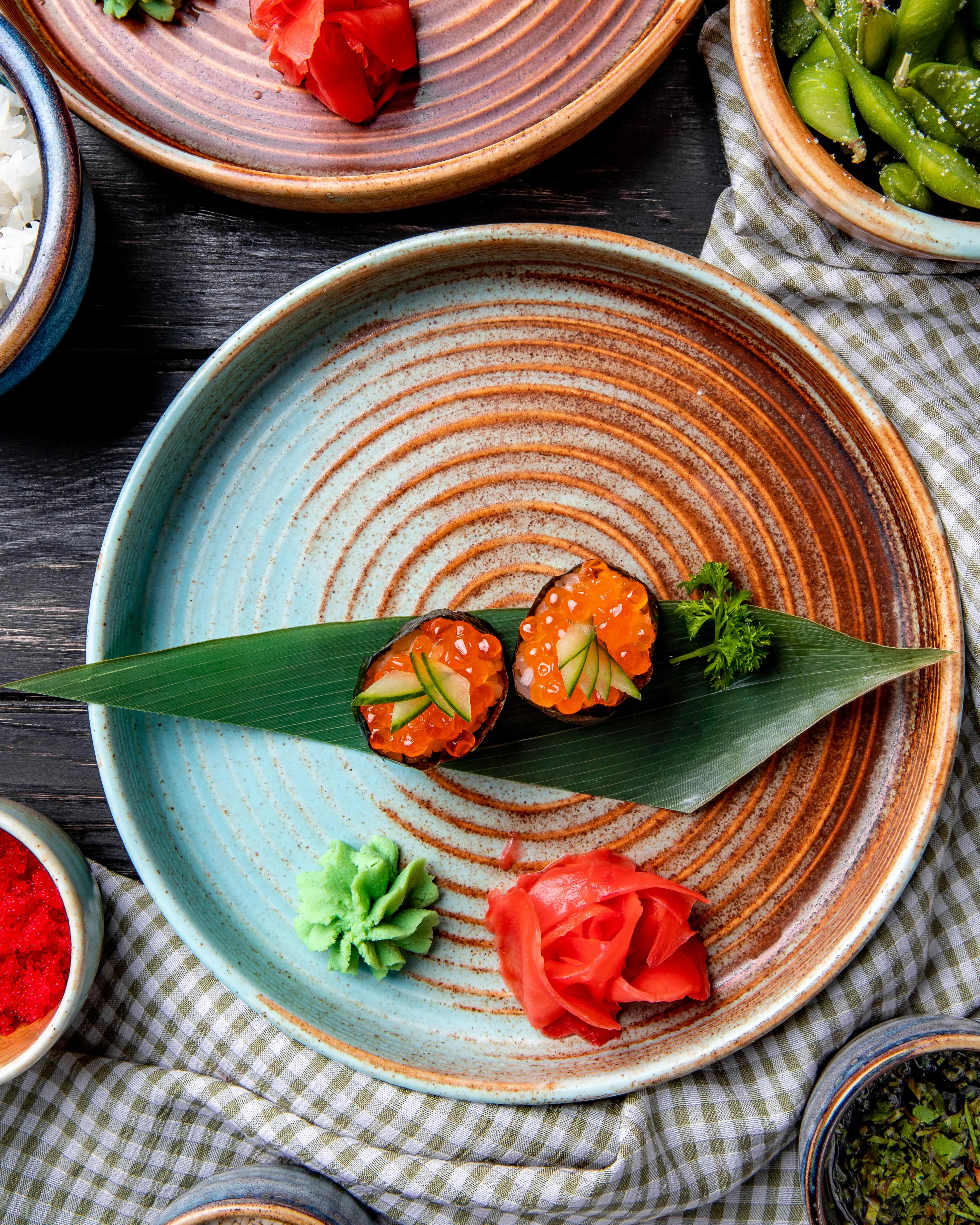 Japanese sushi rolls with salmon roe and wasabi