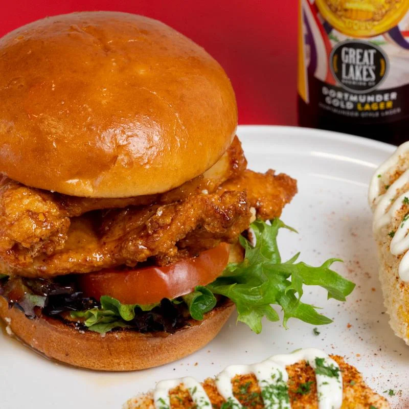 Crispy fried chicken sandwich with lettuce and tomato
