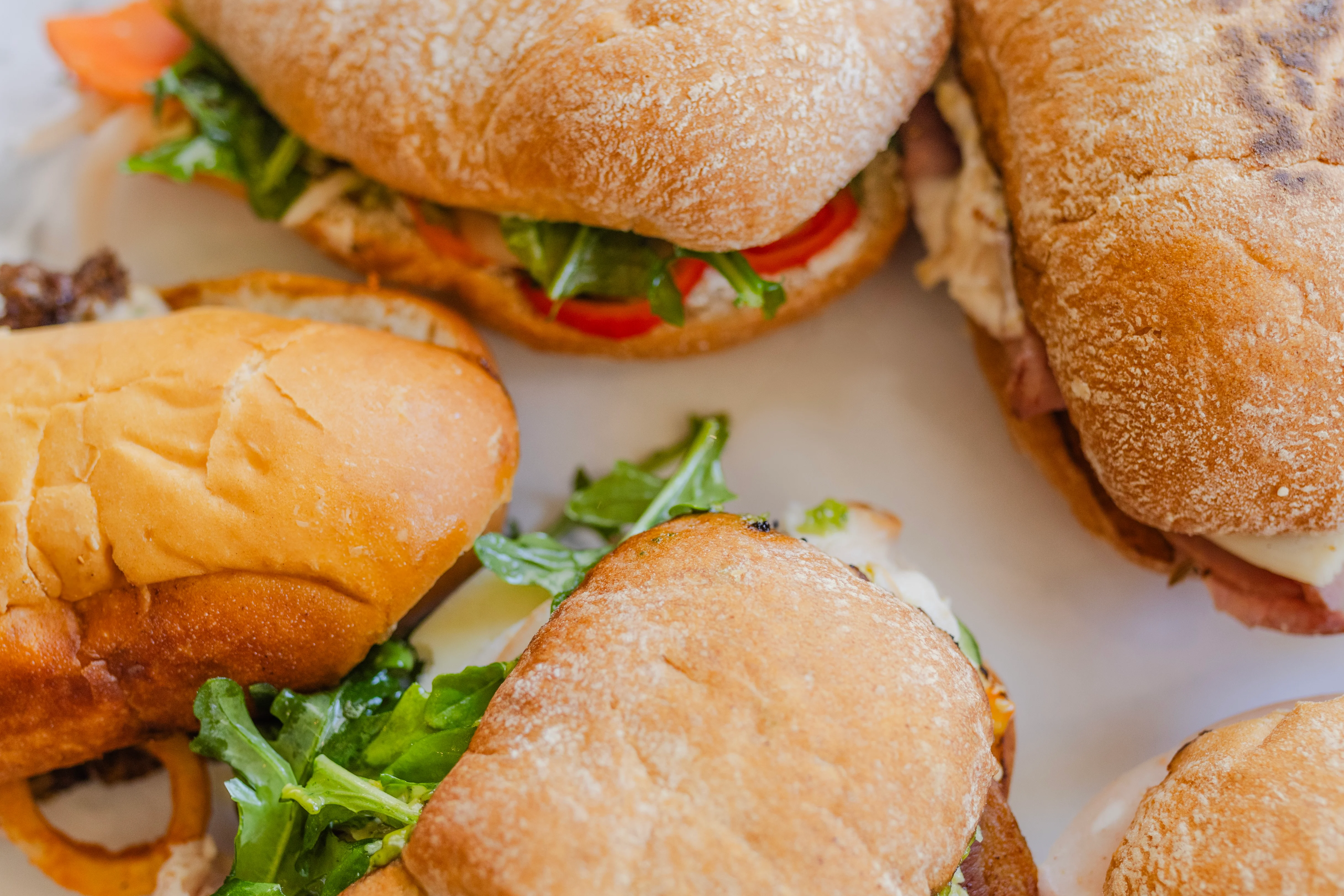 Assorted Italian sandwiches on a platter