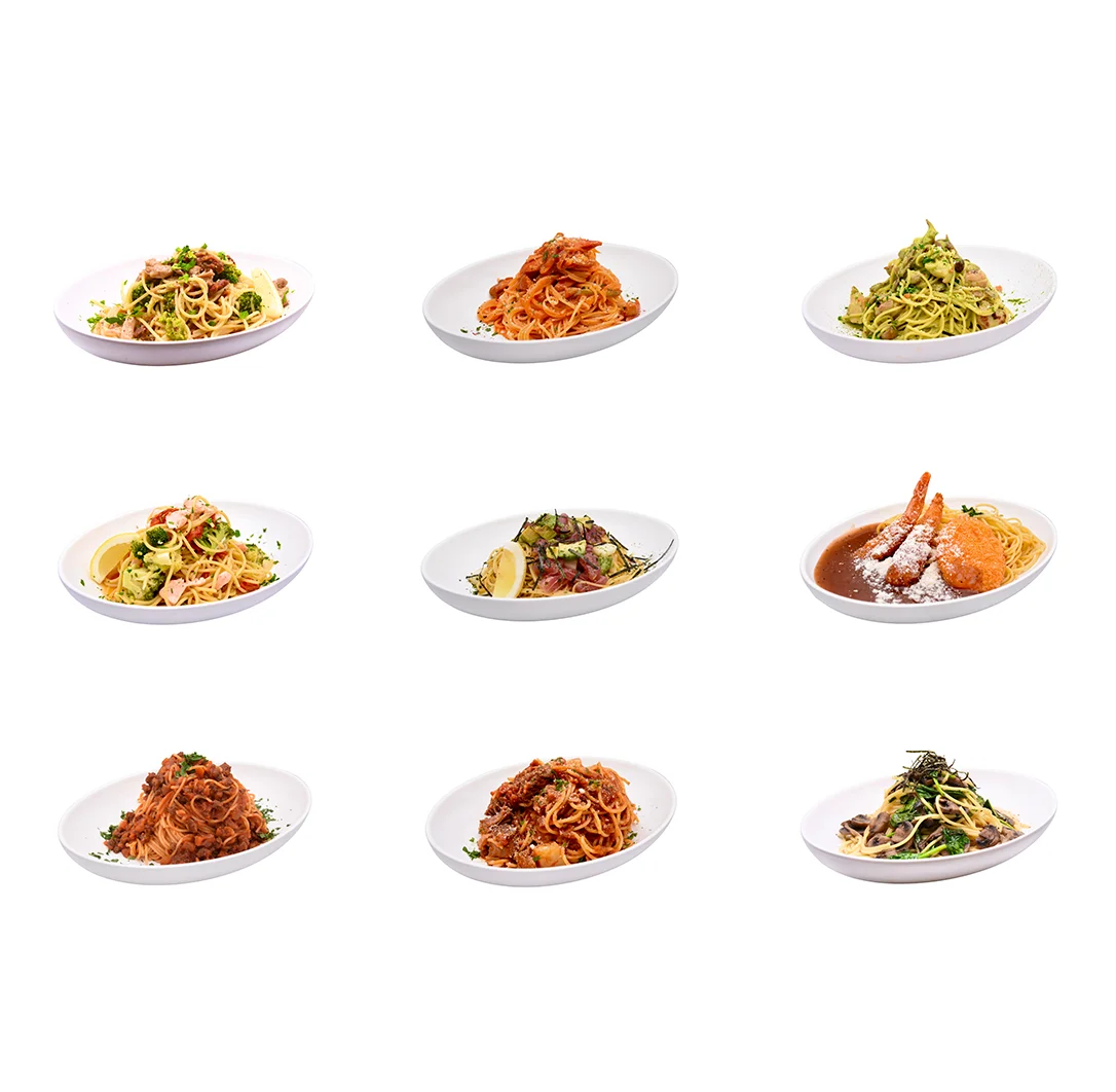 Assorted Italian pasta dishes in elegant white bowls