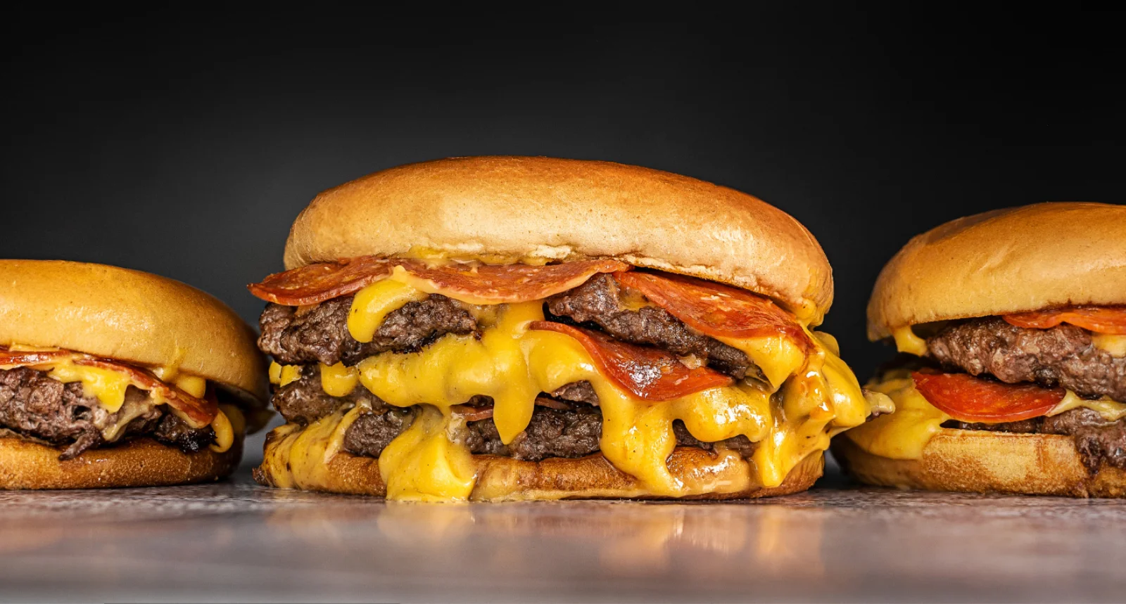 Cheesy pepperoni burger stacked high