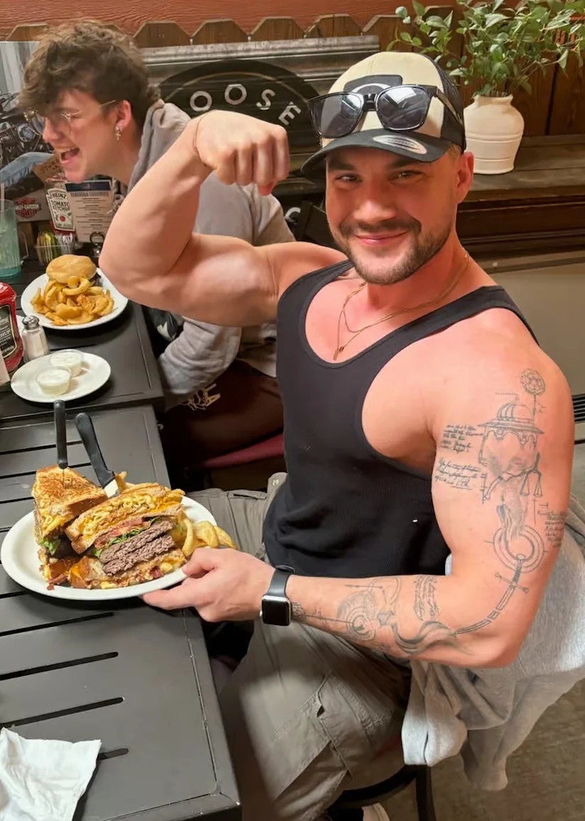 Hearty American cheeseburger with fries in a casual dining setting
