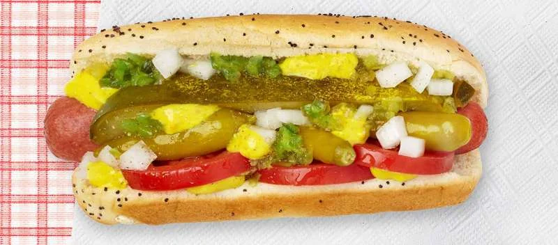 Chicago-style hot dog with vibrant toppings