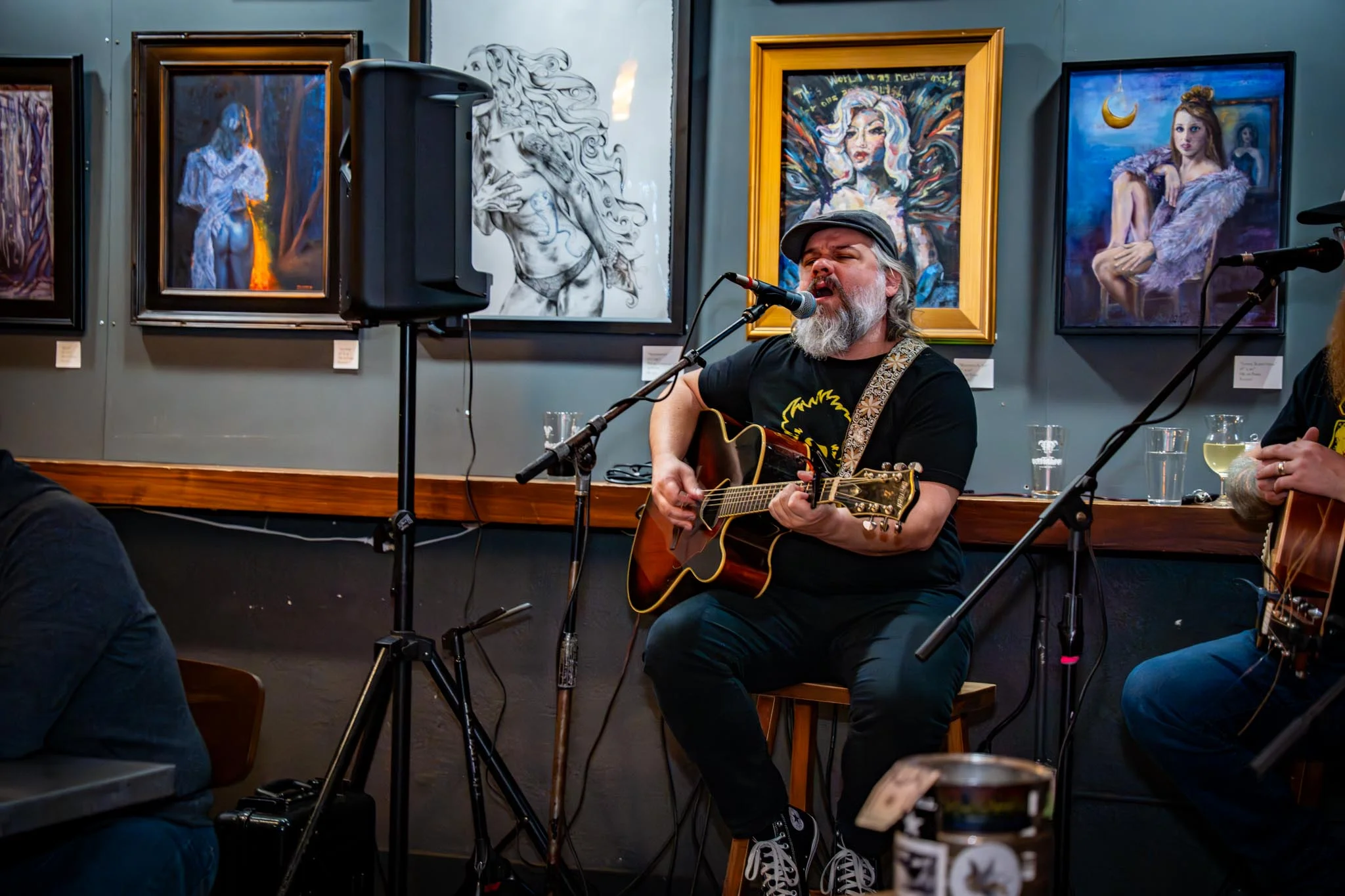 Live music performance in an art-filled restaurant setting
