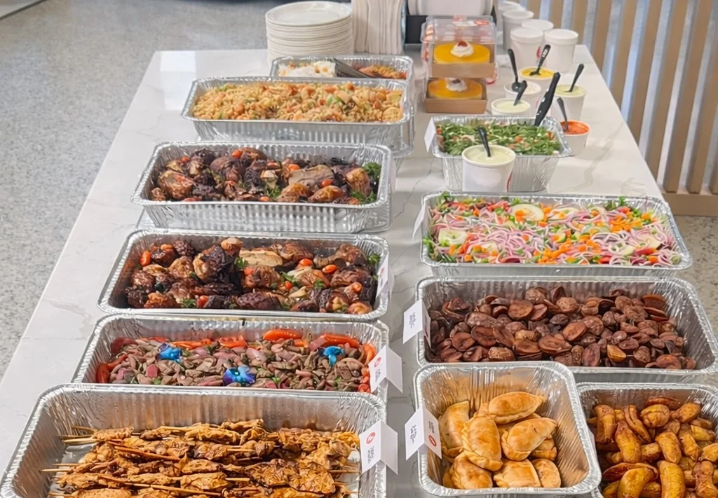 Assorted Asian appetizers including skewers and dumplings