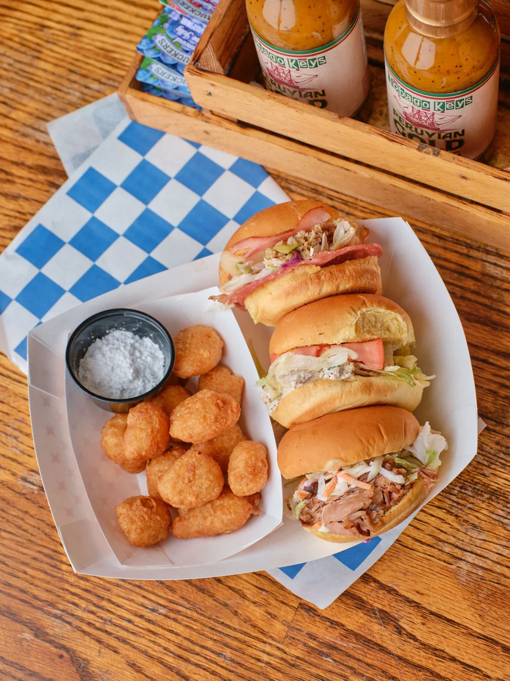 Delicious Caribbean pulled pork sliders with crispy tater tots