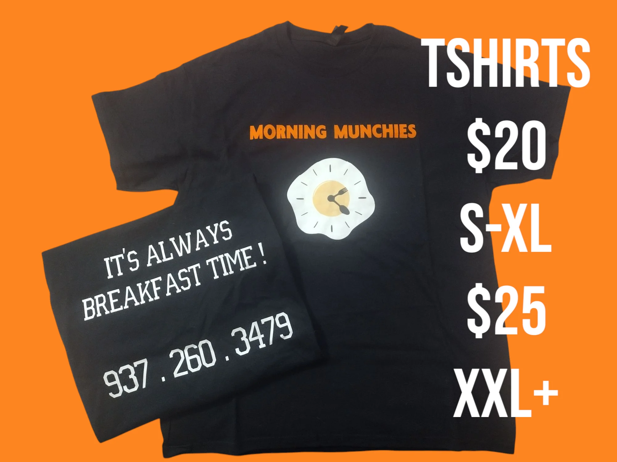 Black t-shirts featuring breakfast-themed designs and prices