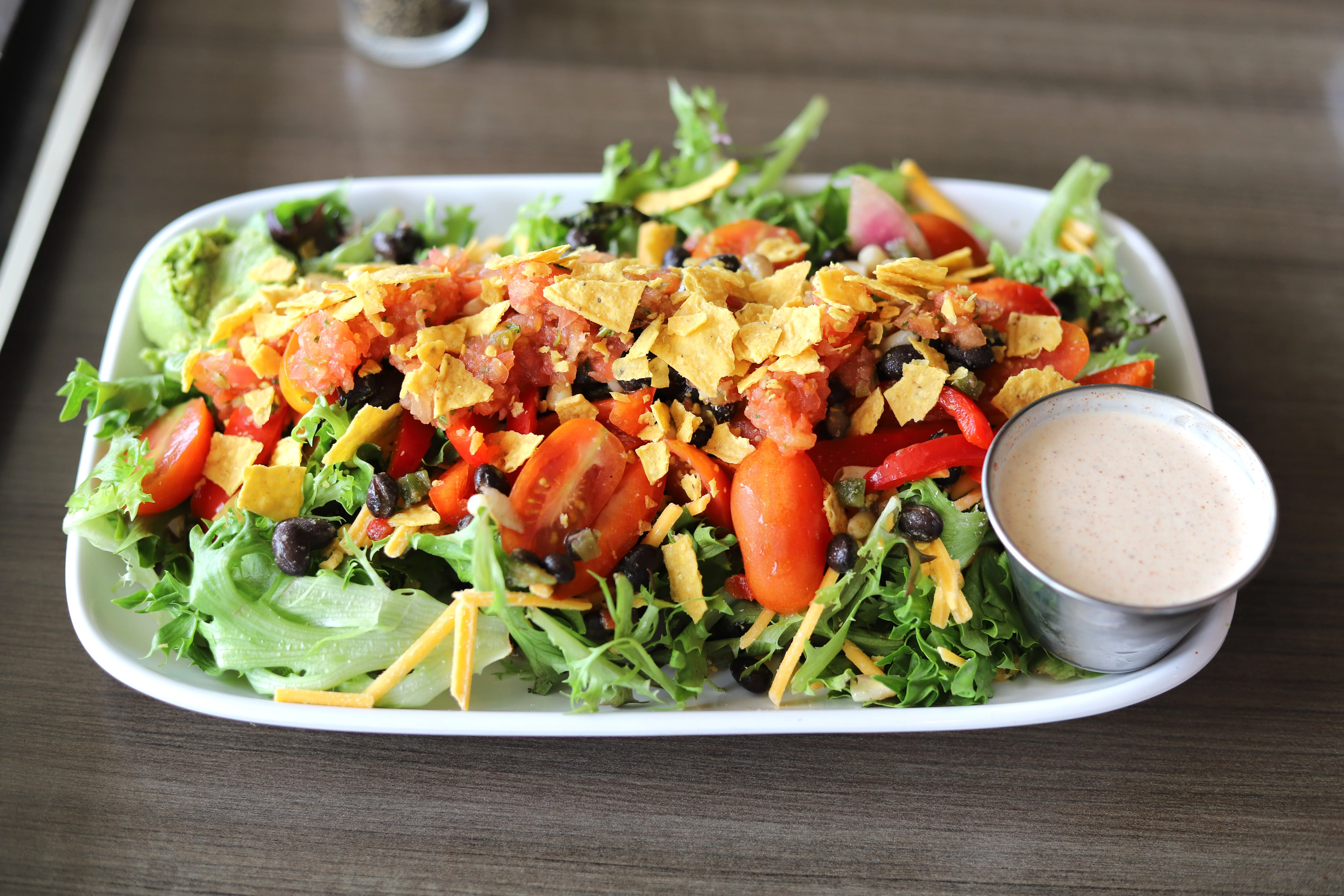 Colorful Mexican taco salad with tortilla chips