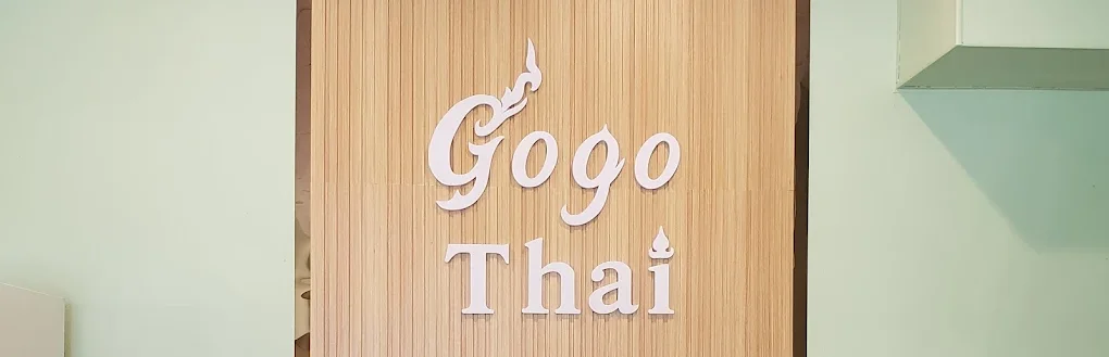 Welcoming Thai restaurant interior with friendly staff
