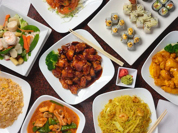 Assorted Chinese dishes including sweet and sour chicken