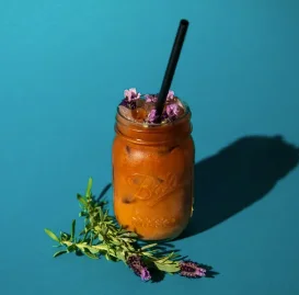 Iced herbal tea with lavender in a mason jar