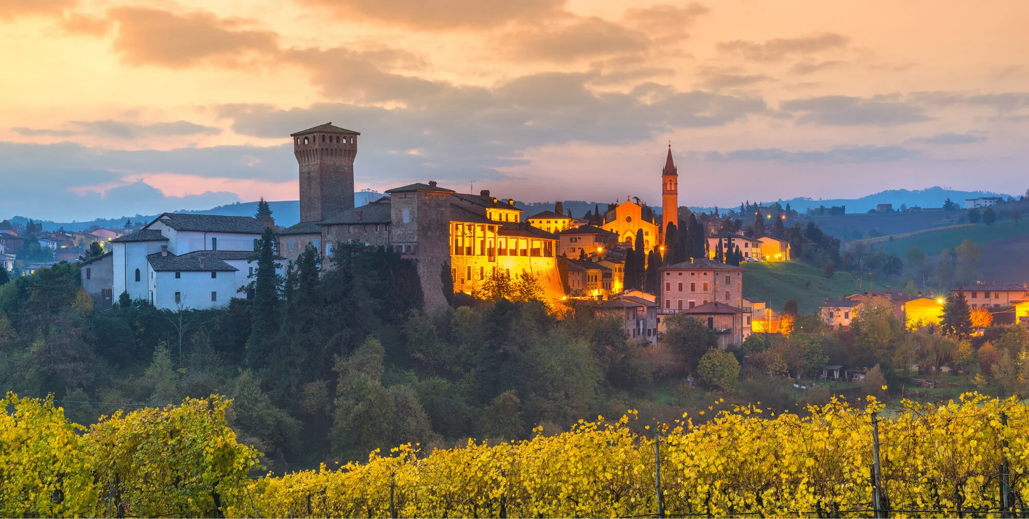 Scenic view of a historic Italian village at sunset