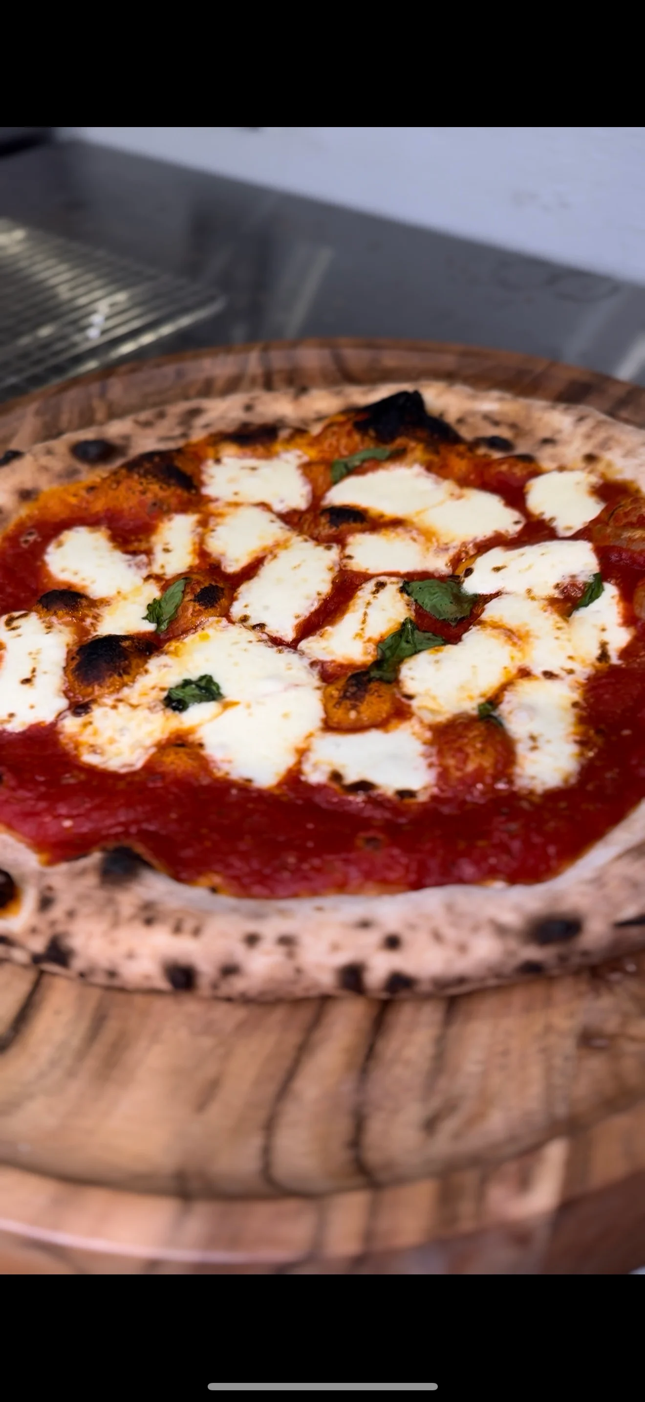 Margherita pizza with fresh mozzarella and basil