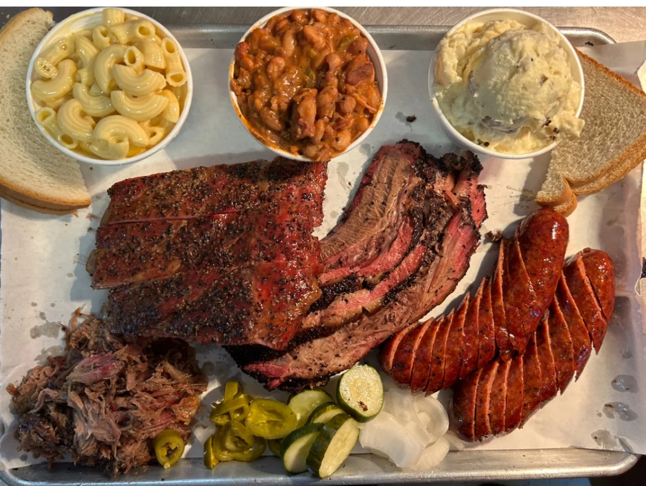 Texas-style barbecue platter with brisket and sausage