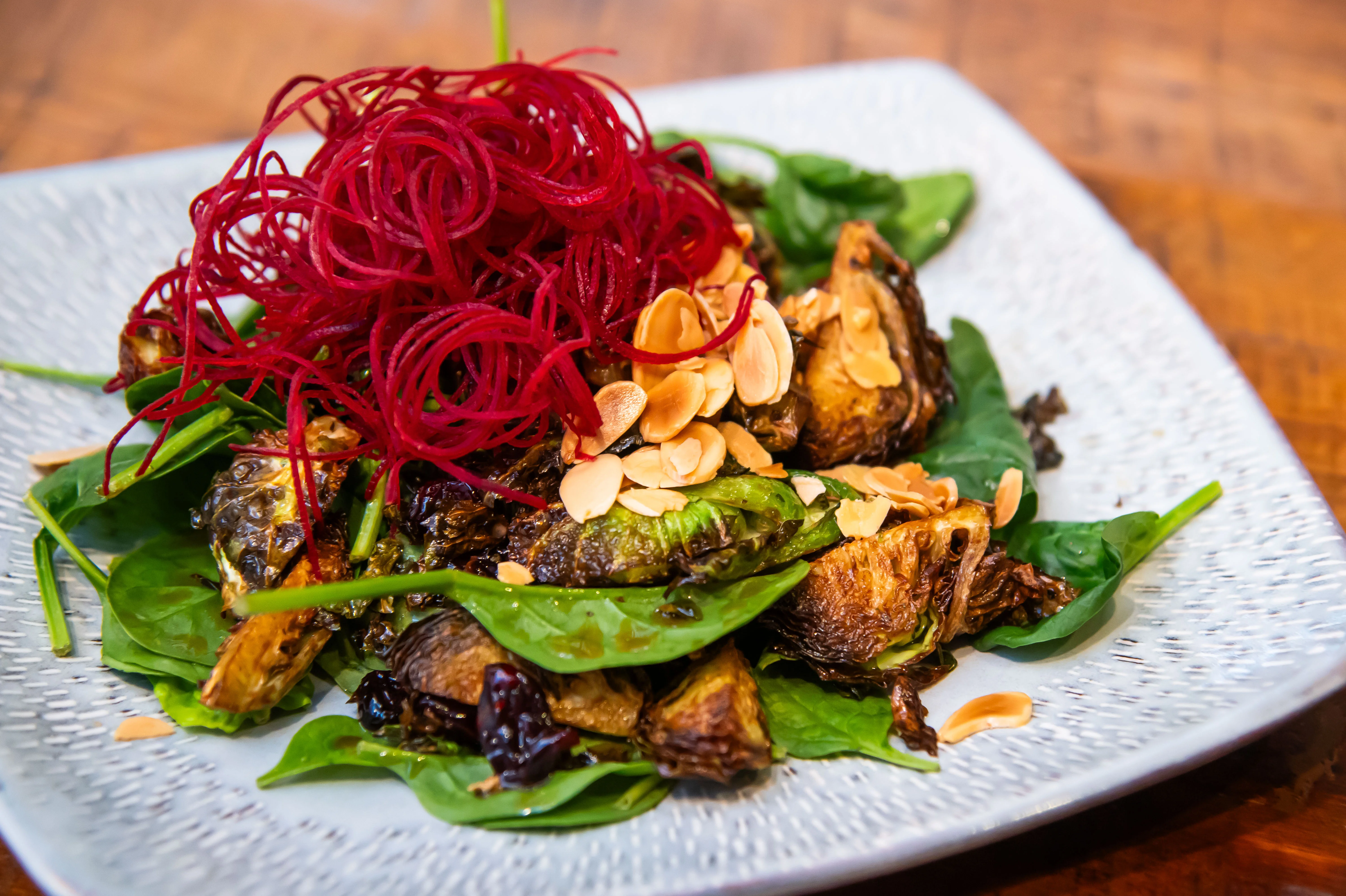 Crispy Brussels sprouts salad with beets and almonds