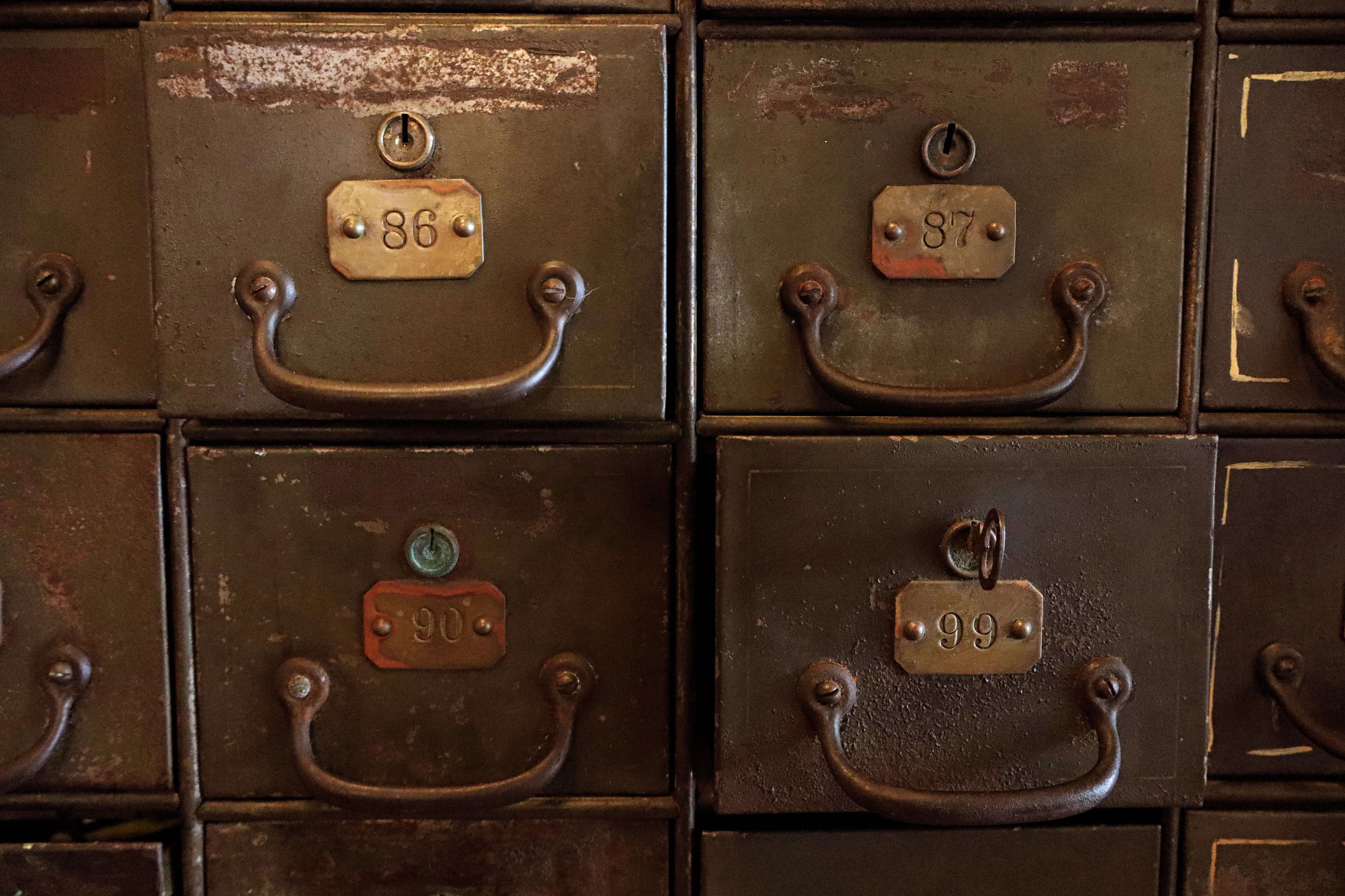 Vintage metal drawers with numbered labels