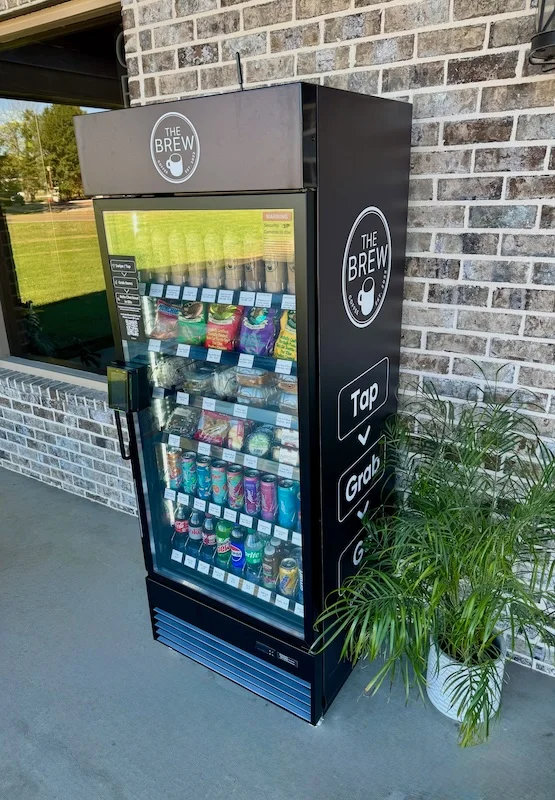 Vending machine offering a variety of beverages and snacks