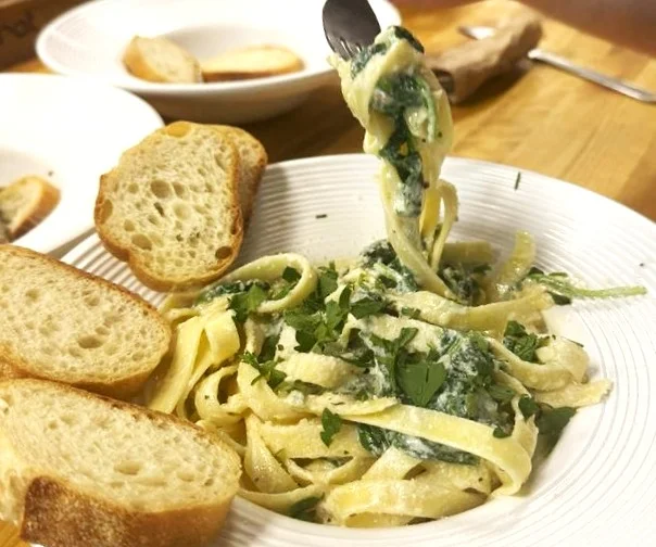 Creamy fettuccine Alfredo garnished with parsley