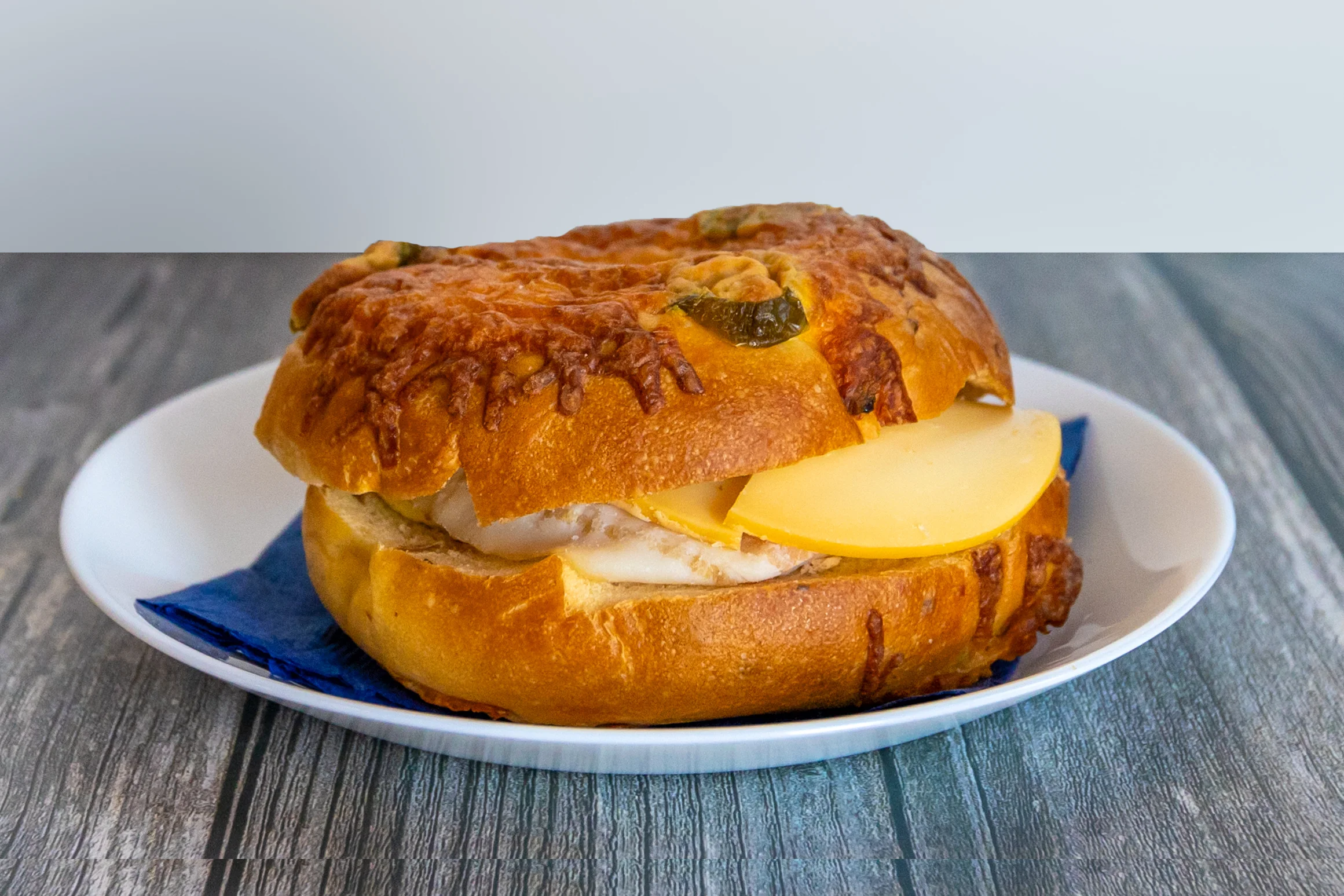 Cheesy chicken sandwich on a toasted bun