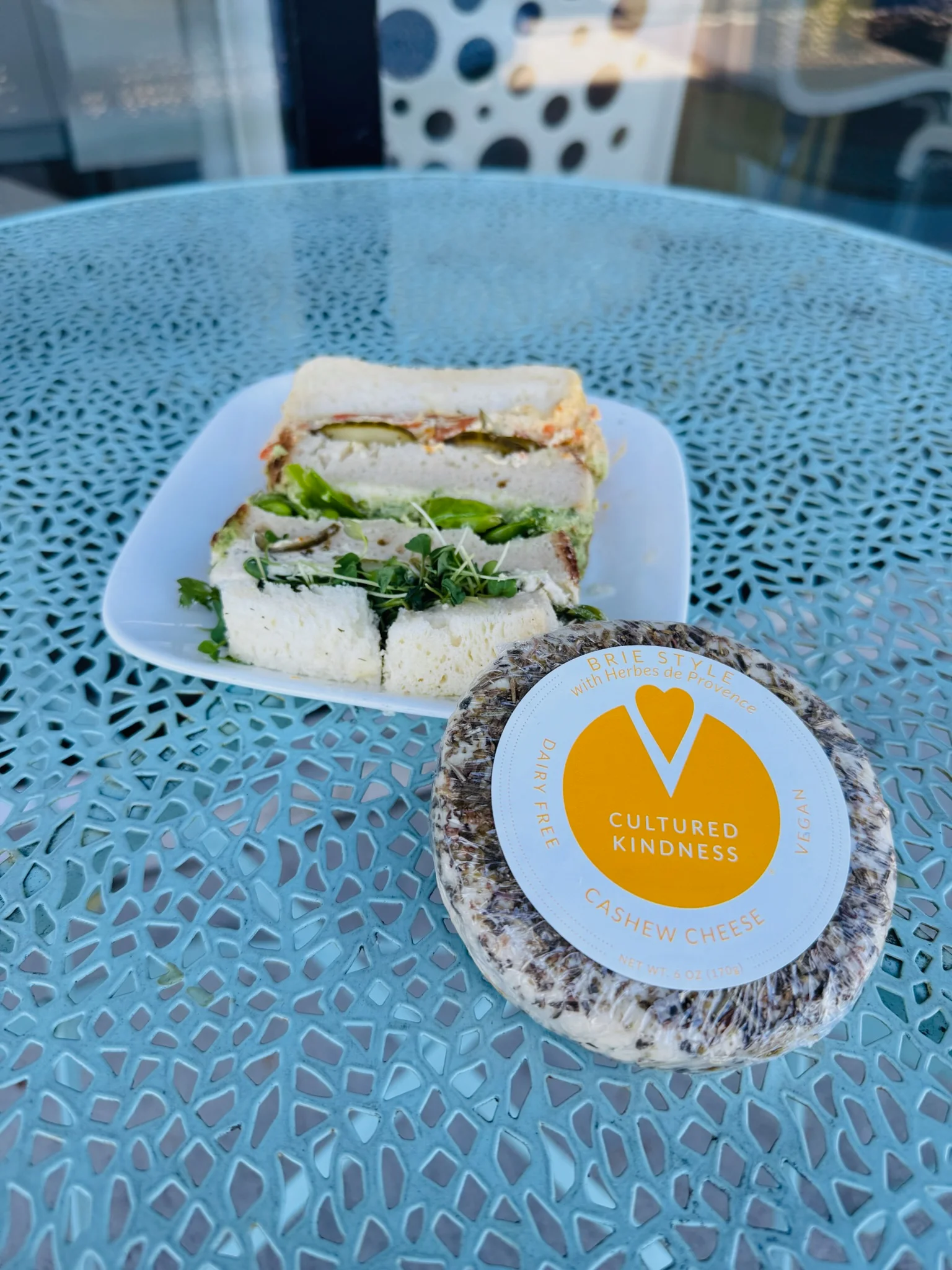 Vegan sandwich with cashew cheese on a decorative table