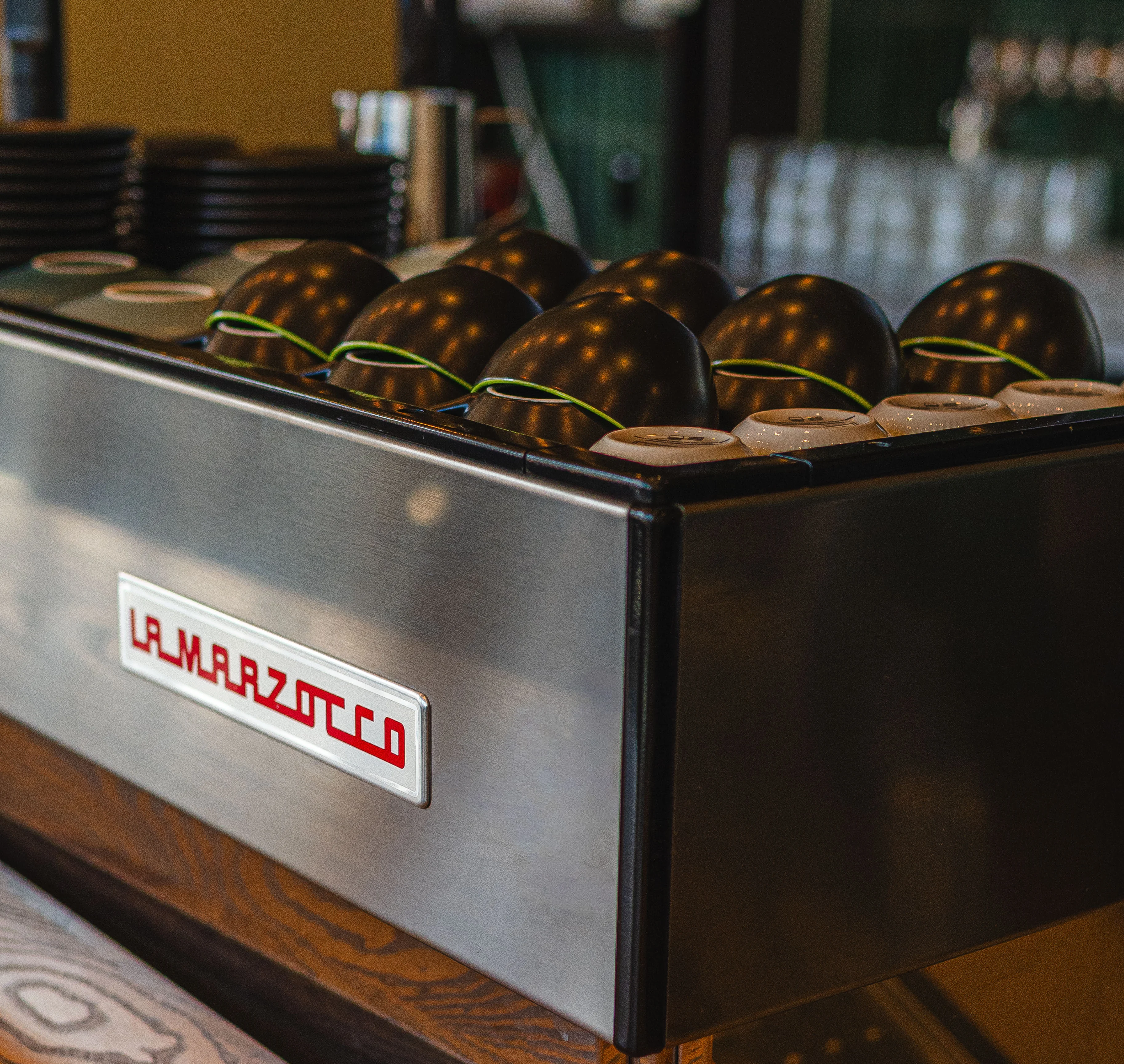La Marzocco espresso machine at a modern coffee bar