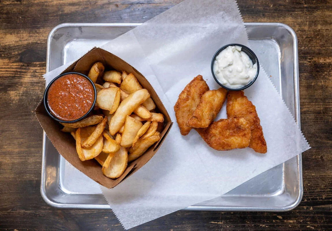 Crispy fish and chips with dipping sauces