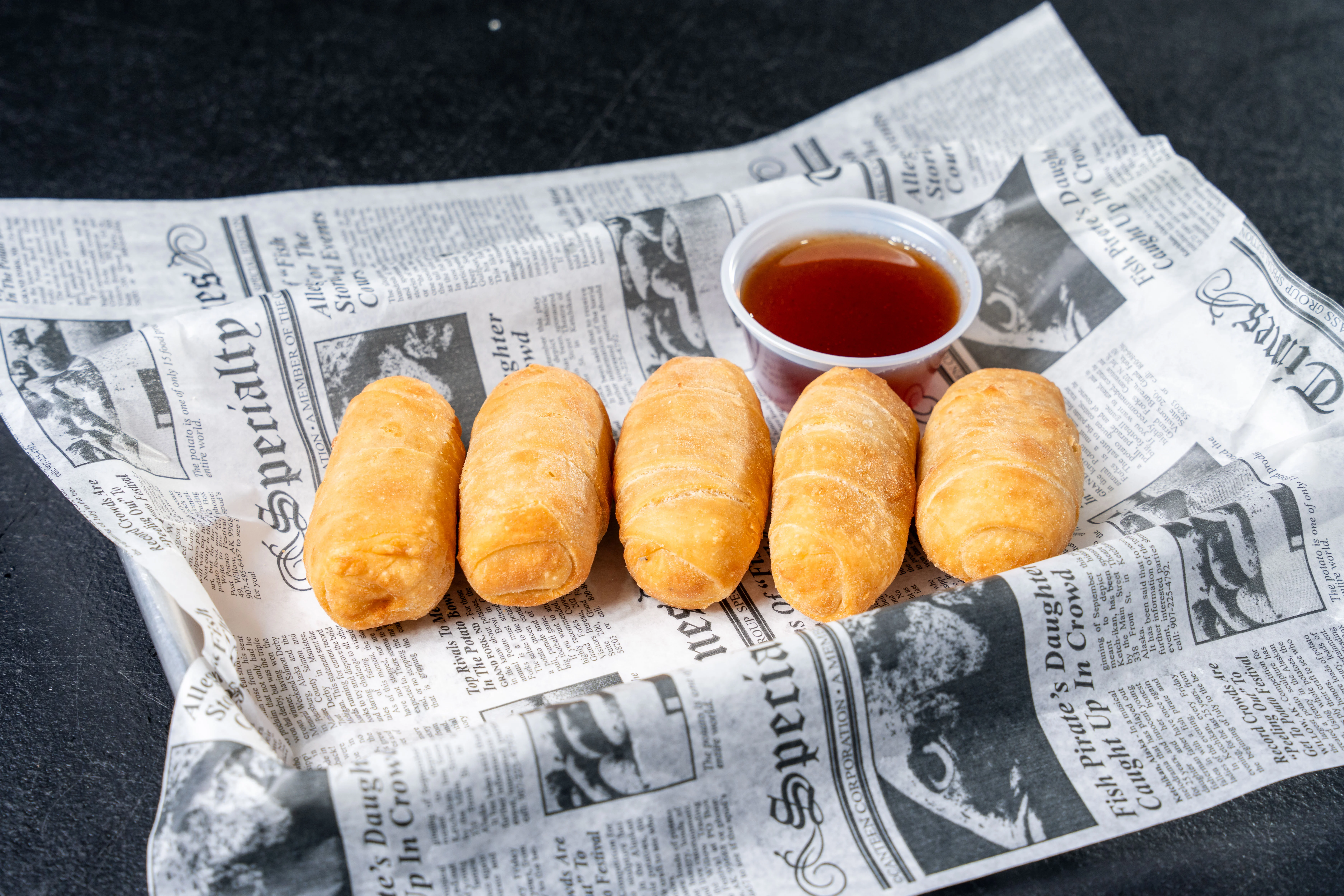 Crispy spring rolls served with dipping sauce