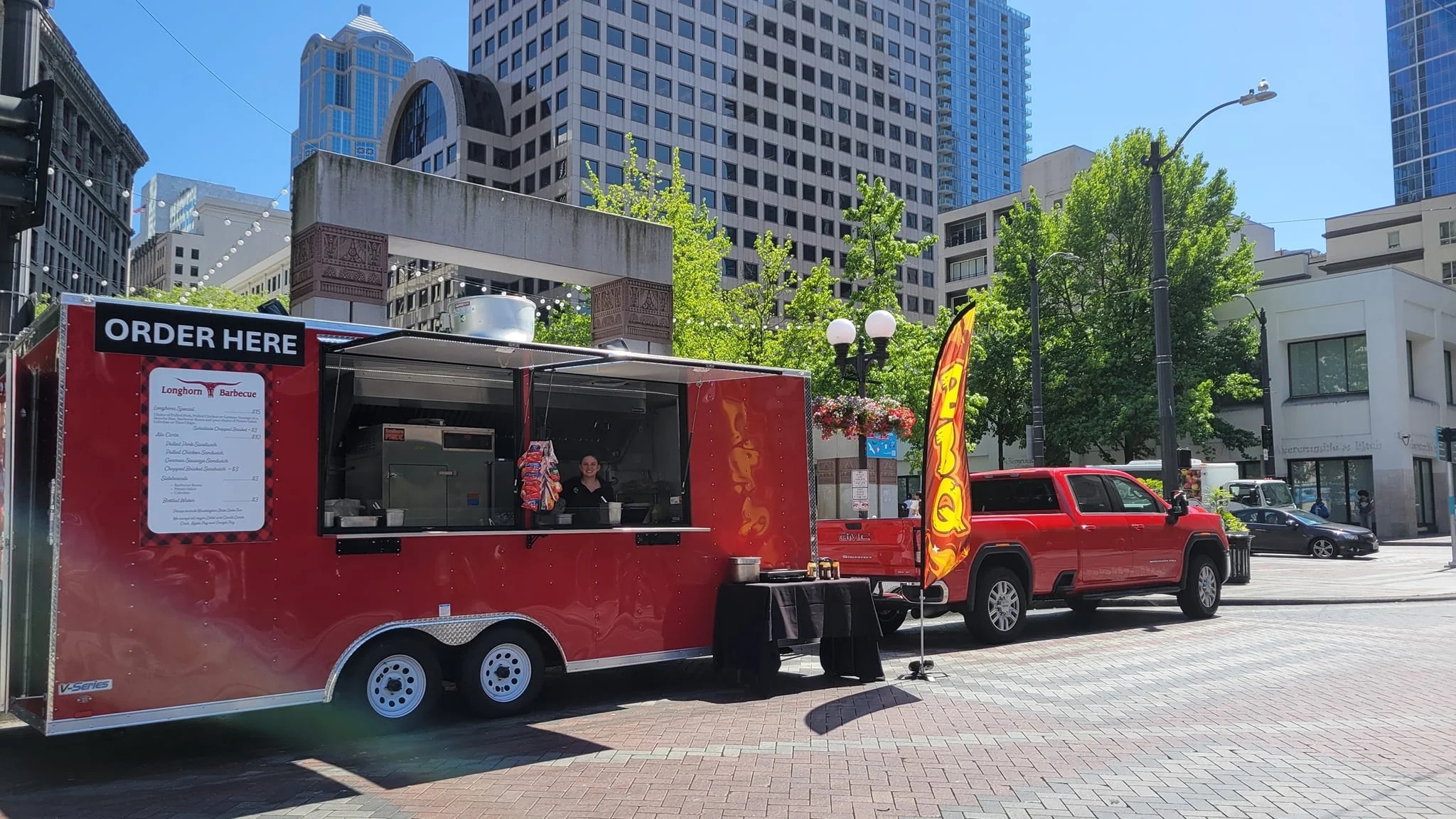 Food truck serving barbecue in an urban setting