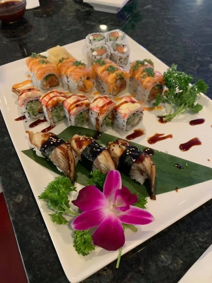Assorted sushi platter featuring rolls and nigiri