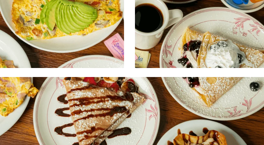 A delicious breakfast spread with omelette, crepes, and coffee.