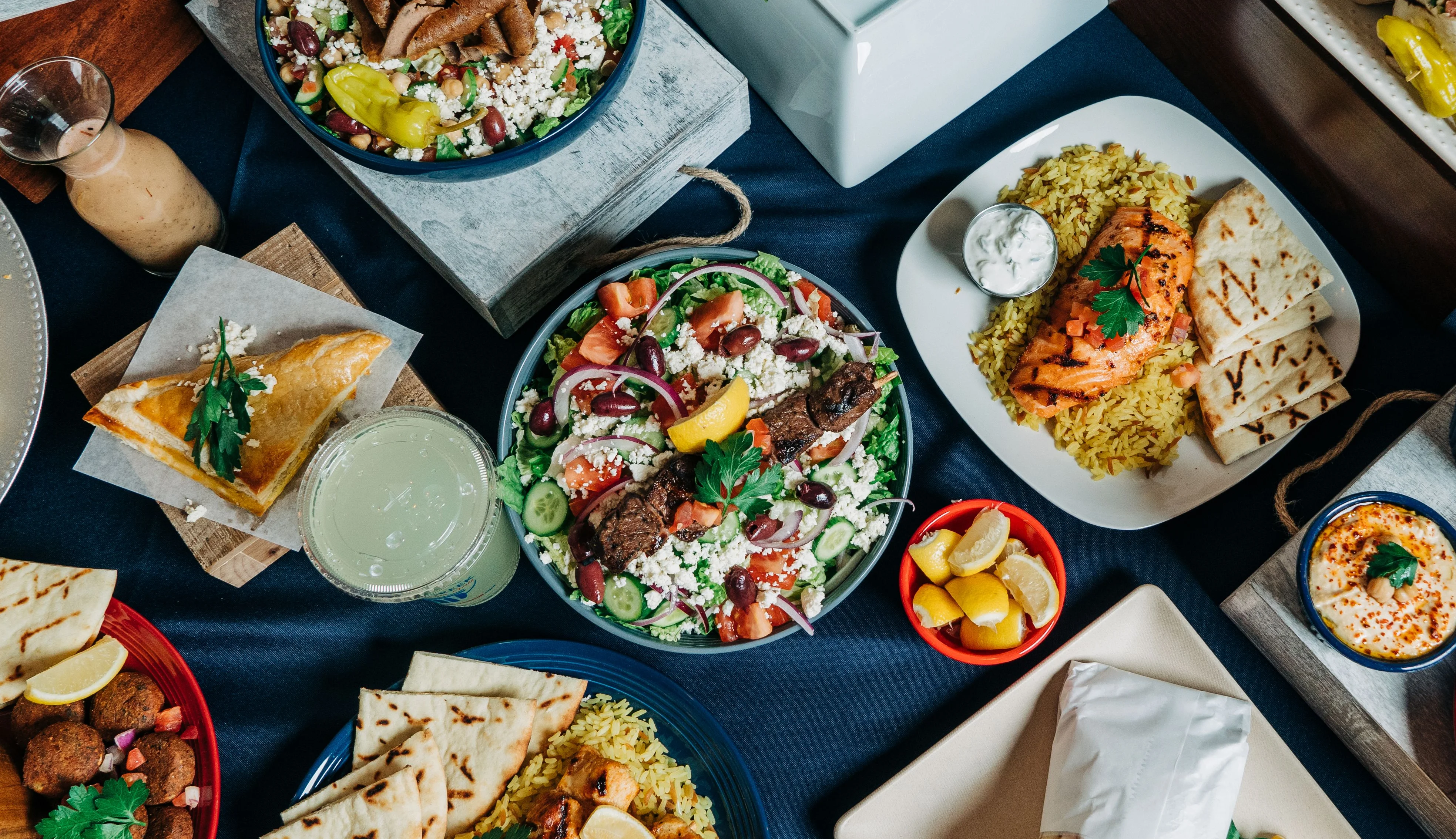 Mediterranean feast with grilled meats and fresh salads