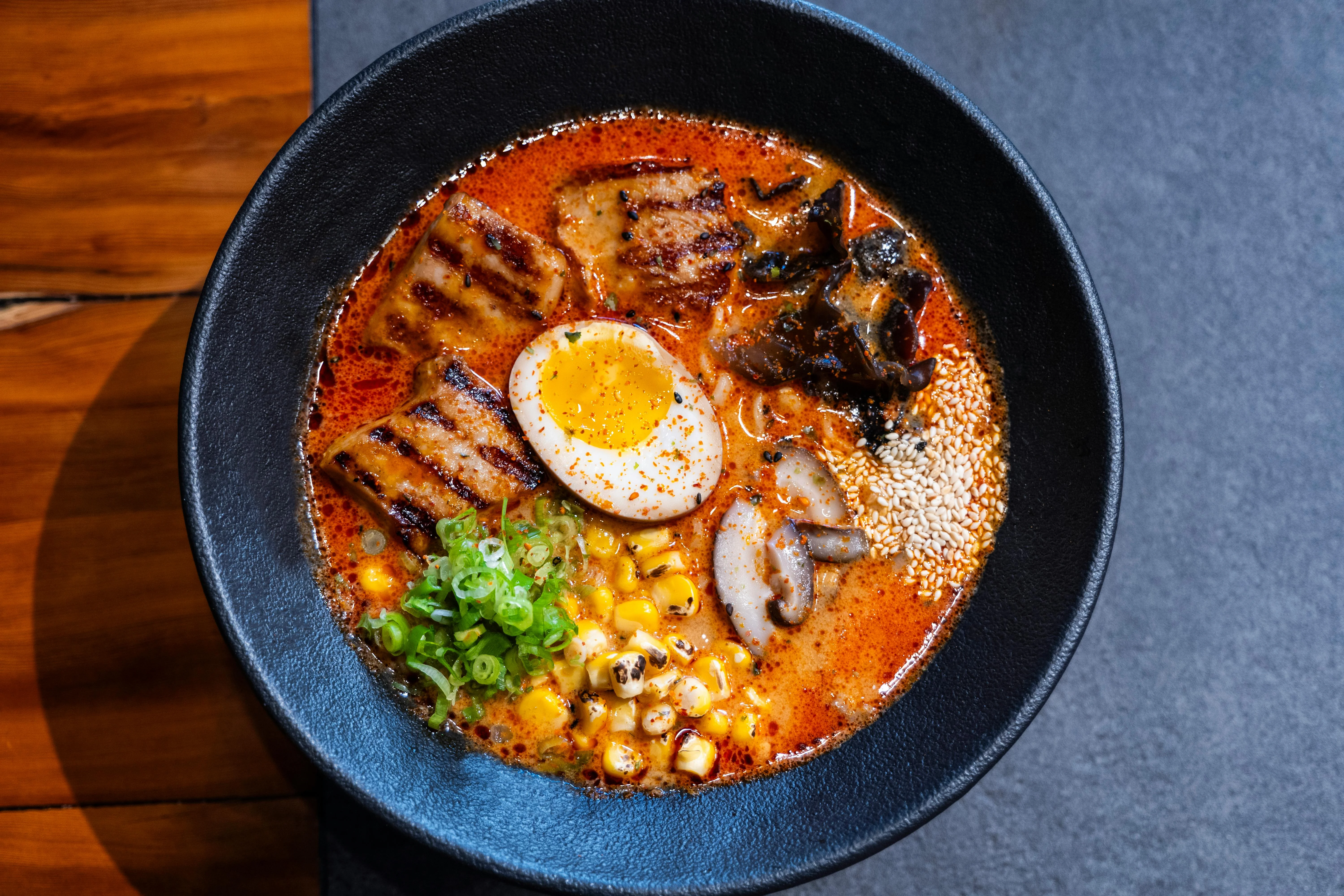 Spicy Japanese ramen with grilled pork and soft-boiled egg