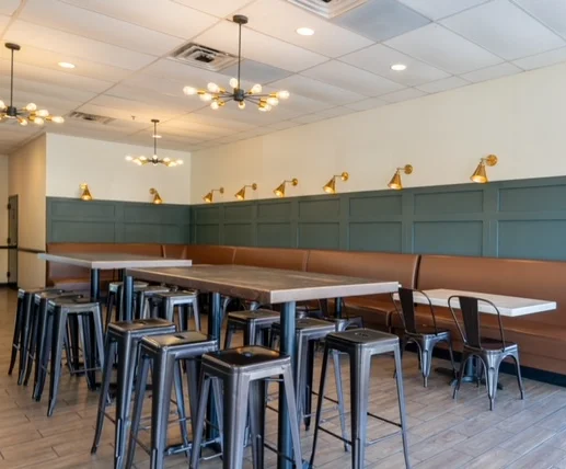 Modern restaurant interior with stylish seating and warm lighting