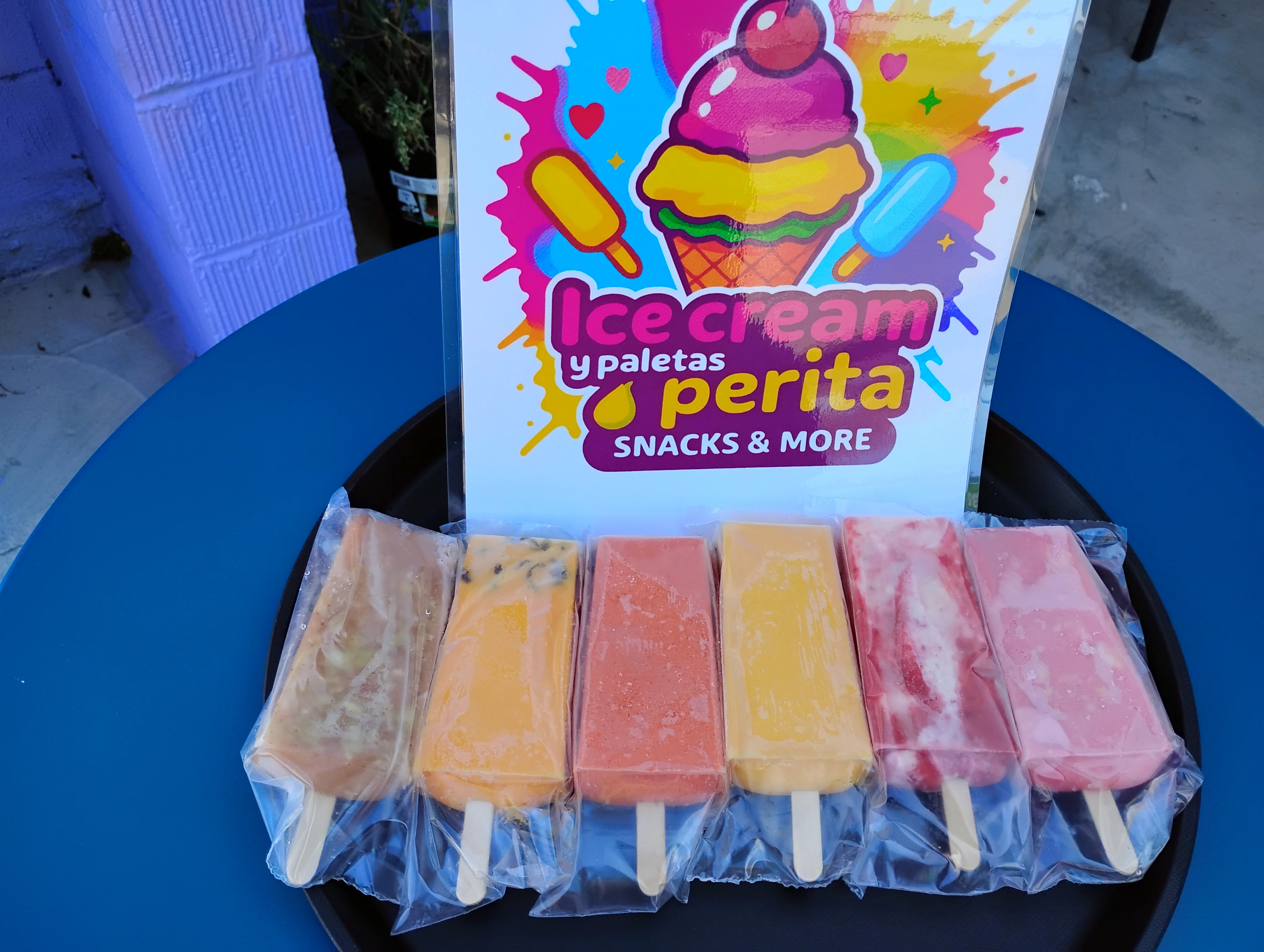 Colorful Mexican paletas displayed at an ice cream shop