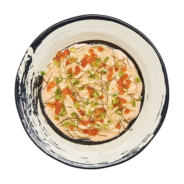 A circular bowl of Mentaiko Udon in a minimalist ceramic bowl. The silky noodles are topped with salmon roe, sliced green onions, and fine strips of nori.
