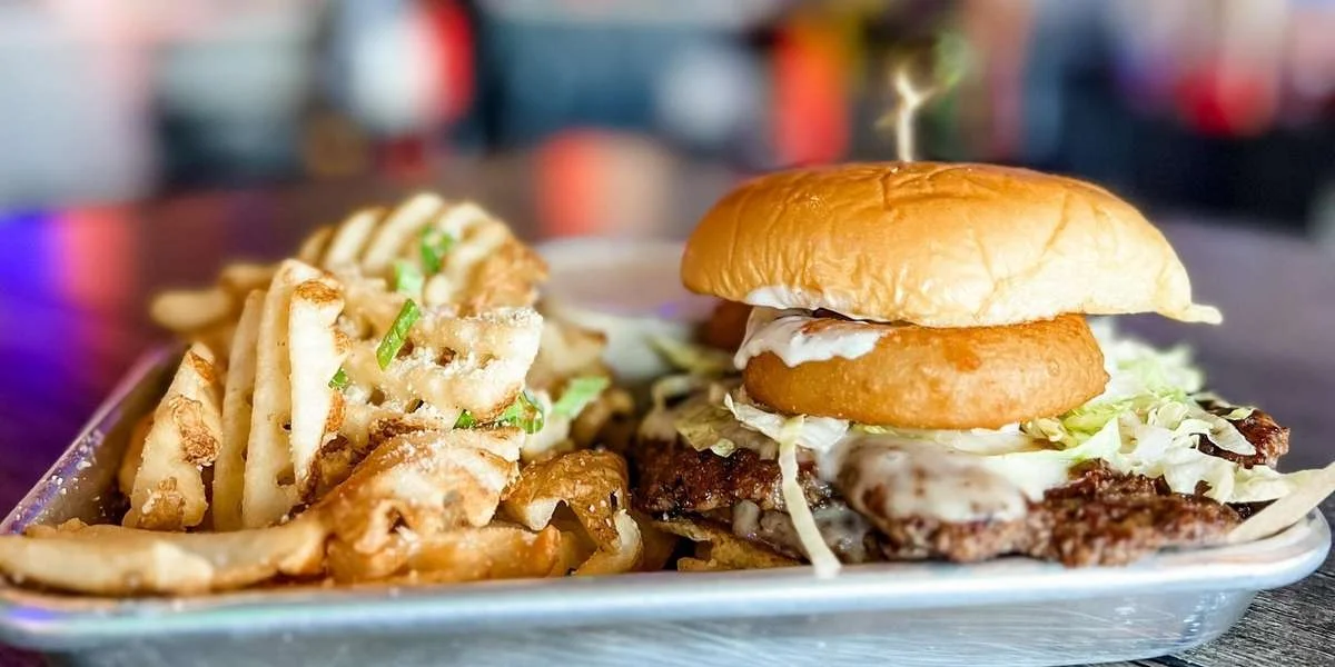 Juicy American cheeseburger with crispy fries