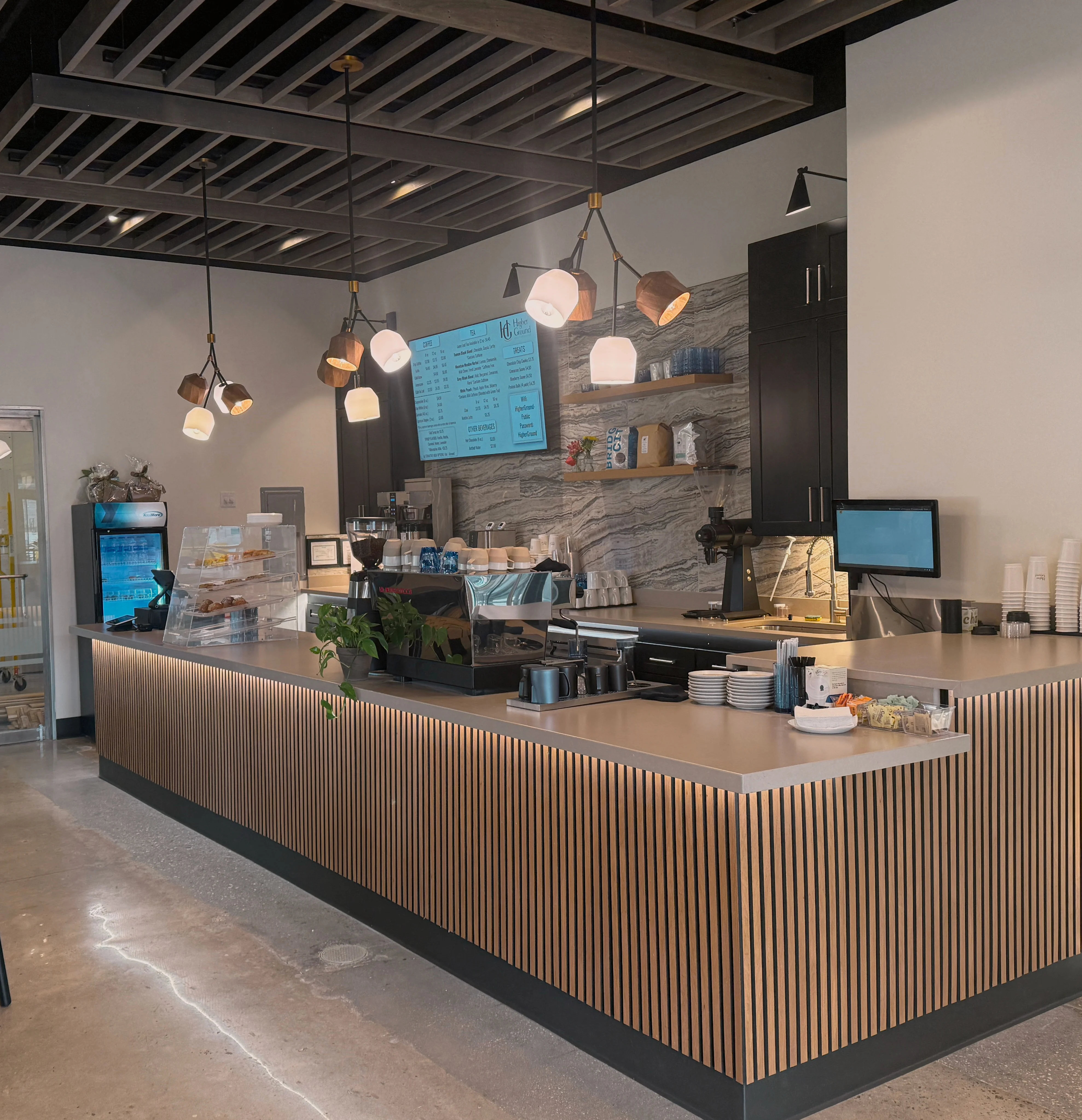 Modern café interior with stylish lighting and wooden accents