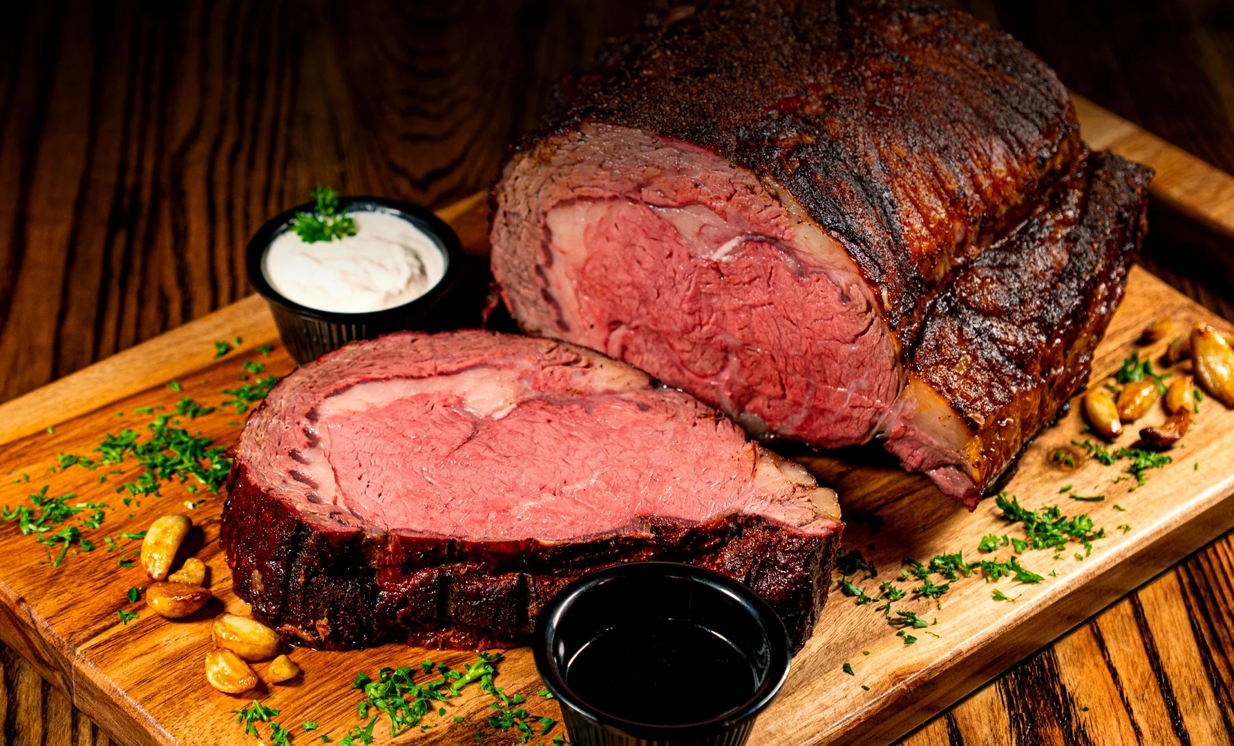 Perfectly cooked prime rib served with sauces