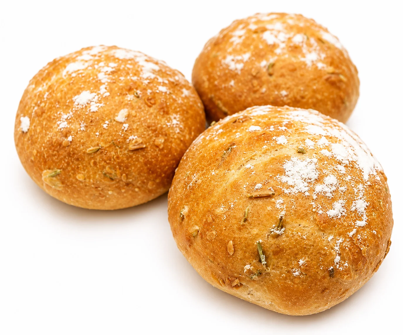 Three round, golden-brown bread rolls dusted with flour.
